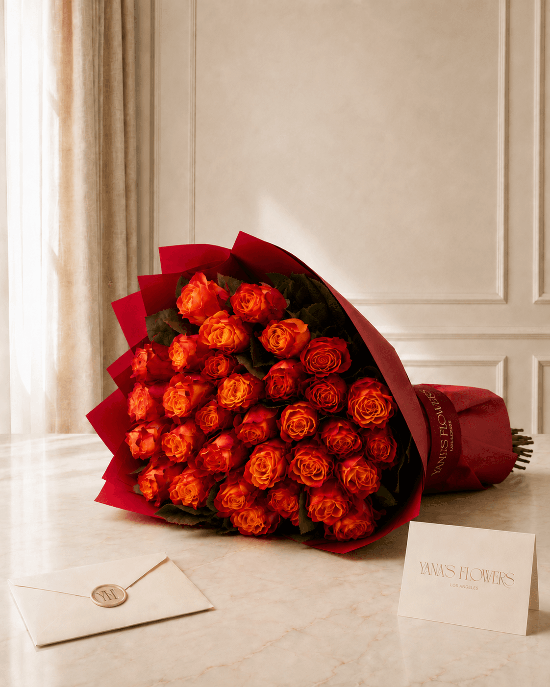 Ember Rose wrapped bouquet by Yana's Flowers