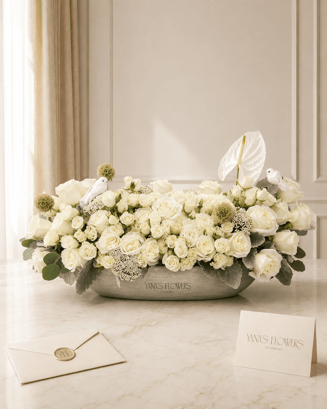 White Sanctuary vase arrangement by Yana's Flowers