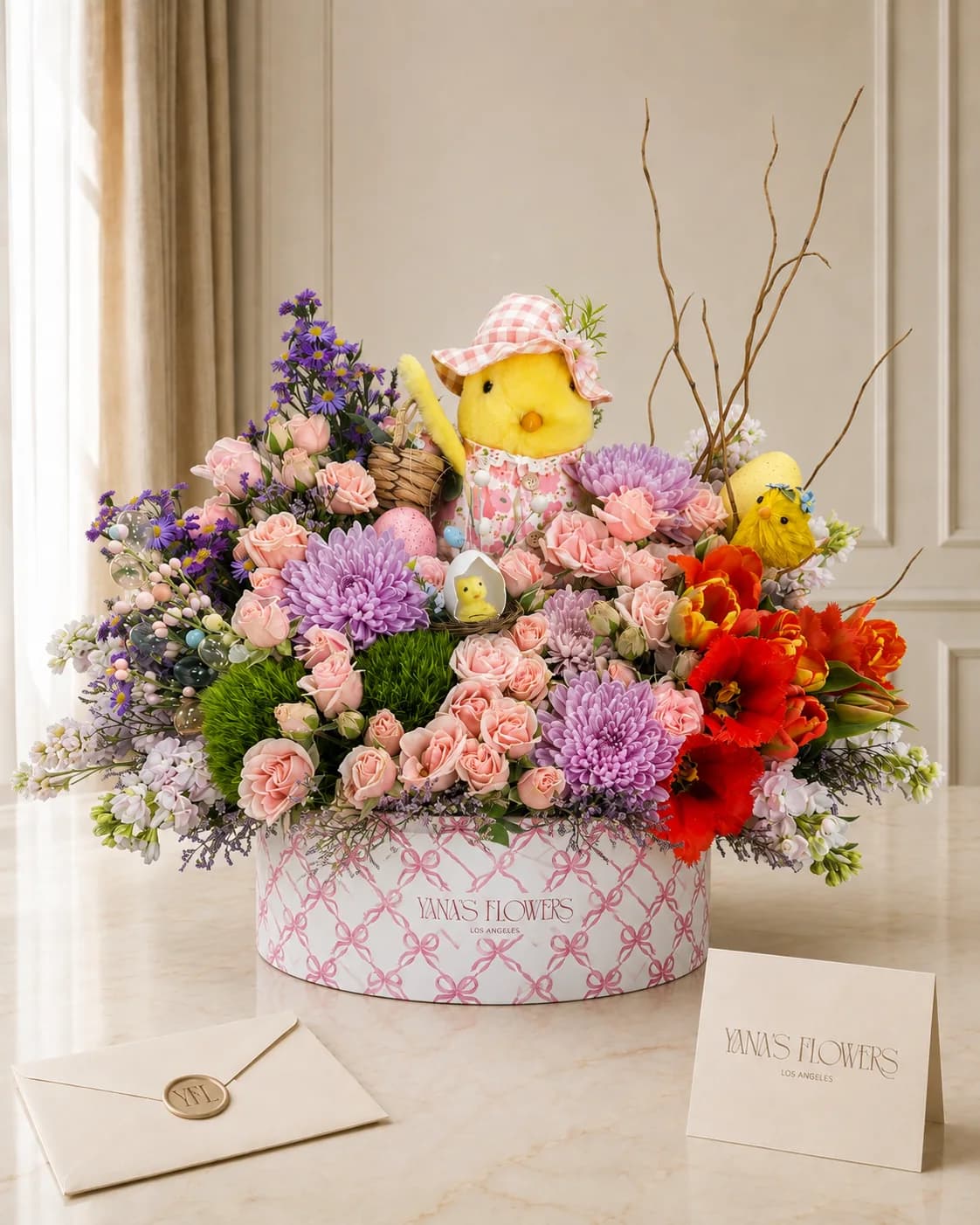 Easter Chickadee flower basket arrangement by Yana's Flowers
