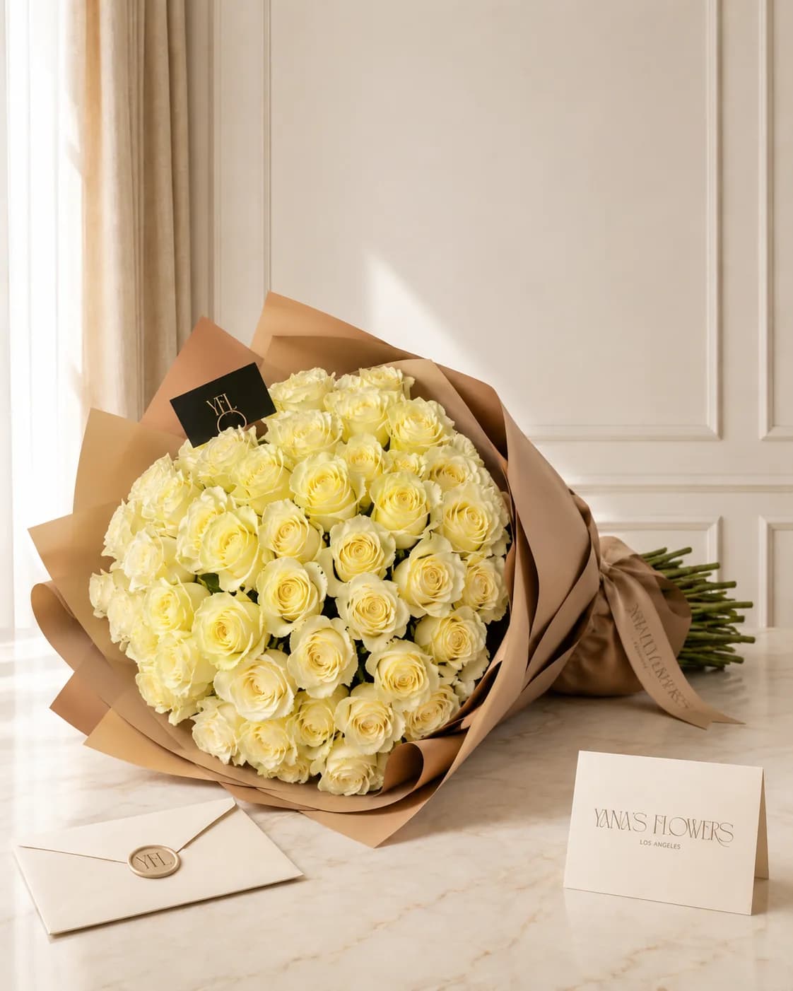 Vanilla Embrace wrapped bouquet by Yana's Flowers